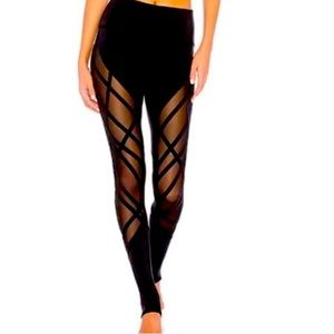 Alo Yoga size XS High Waisted Stirrup leggings - Black and mesh